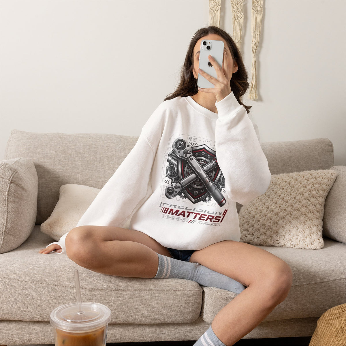 Model wearing MPM Engine Pistons Crewneck Sweatshirt featuring crossed pistons graphic, showcasing precision in design.